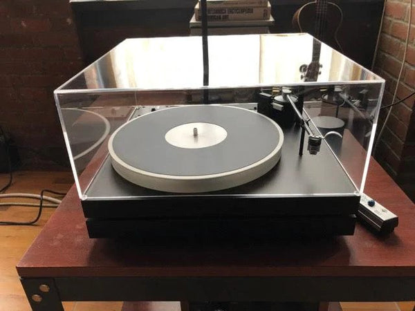 Top of Display Case Used as Cover for a New Stylish Record Player