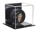 Clear acrylic hockey puck holder with stabilizing ring for collectible puck display
