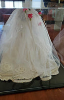 Bride doll showcased in a spacious 18x14x12 inch display case