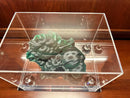 Green malachite crystal specimen in transparent acrylic display box for home or office decor