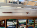 Clear acrylic bracket for displaying a standard size golf club